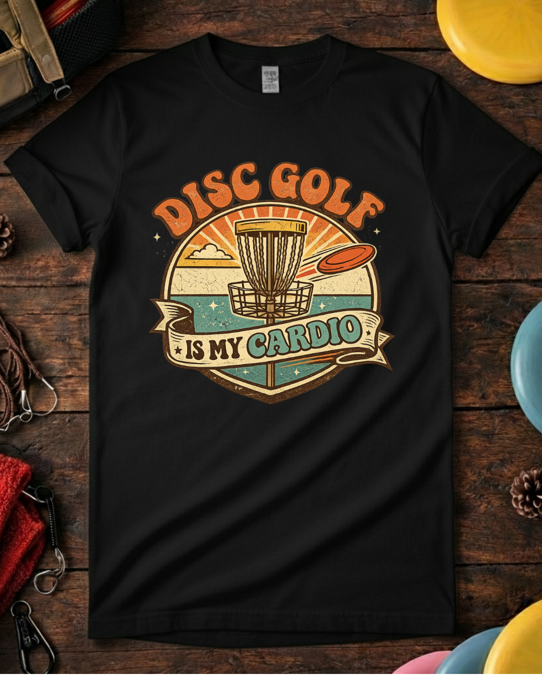 Unisex Disc Golf Is My Cardio shirt laid flat with colorful discs